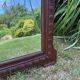 Antique carved wooden mirror