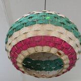 Handmade suspension in coloured woven natural plant fibres.