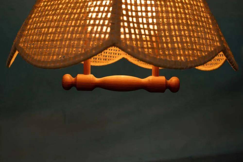 Swedish suspended lamp in bohemian strap.
