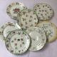 7 small plates in fine Limoges porcelain