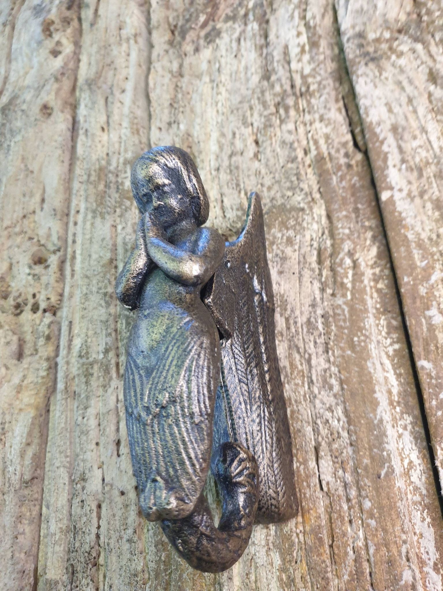 Petit heurtoir sirène ou angelot en fonte couleur bronze - xxè