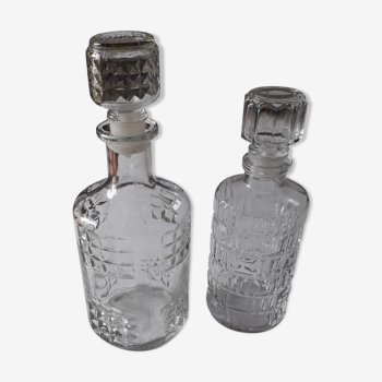 Set of 2 chiseled glass liquor decanters