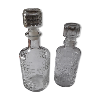 Set of 2 chiseled glass liquor decanters