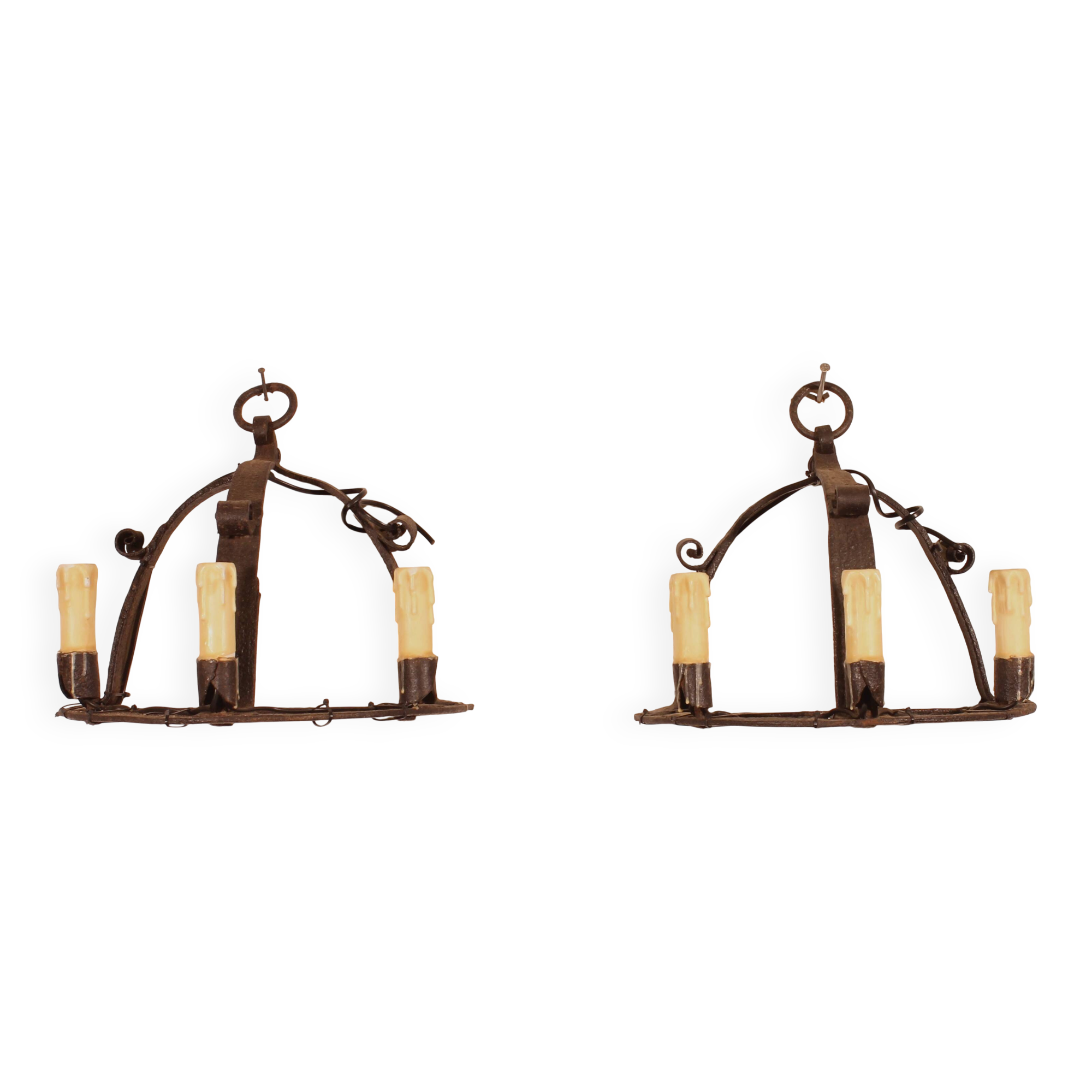 Pair of wrought iron wall sconces in medieval style