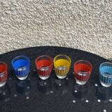 Liquor service consisting of a carafe and 6 small shot glasses, vintage houndstooth pattern