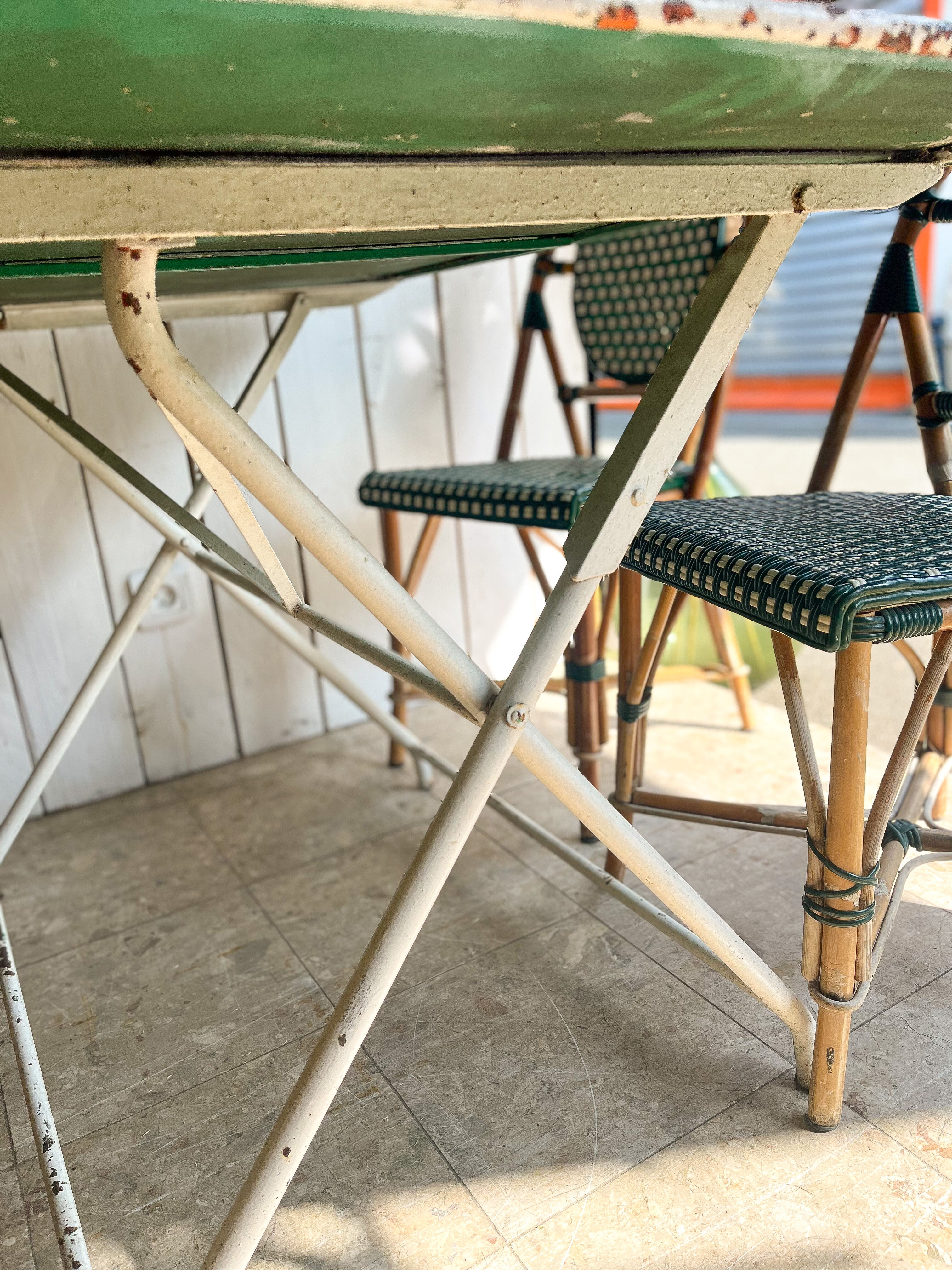 White folding metal bistro table