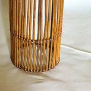 Mid-century rattan floor lamp, in the style of Louis Sognot.