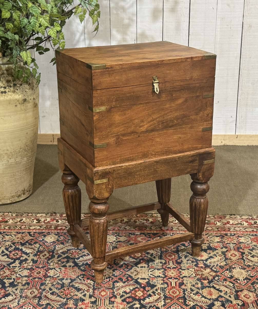 Teak bottle cabinet on legs in marine style
