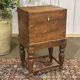 Teak bottle cabinet on legs in marine style