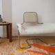 Fauteuil en laine bouclette écrue et inox