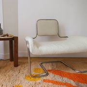 Armchair in ecru wool and stainless steel