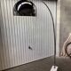 Arc floor lamp design of the 80s