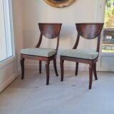 Pair of mahogany gondola chairs – Empire style – 20th century, restored