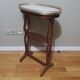 Saddle pedestal table with marble top in Louis XV style