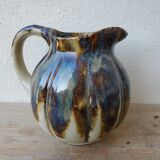 Ceramic pitcher in the shape of a coloquinte melo.