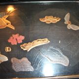 Set of two brown and black Chinese lacquer trays with bird decor