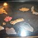 Set of two brown and black Chinese lacquer trays with bird decor