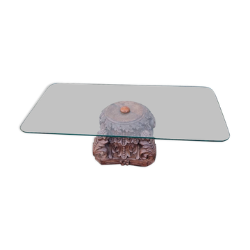 Coffee table with carved wooden legs from India, glass top.