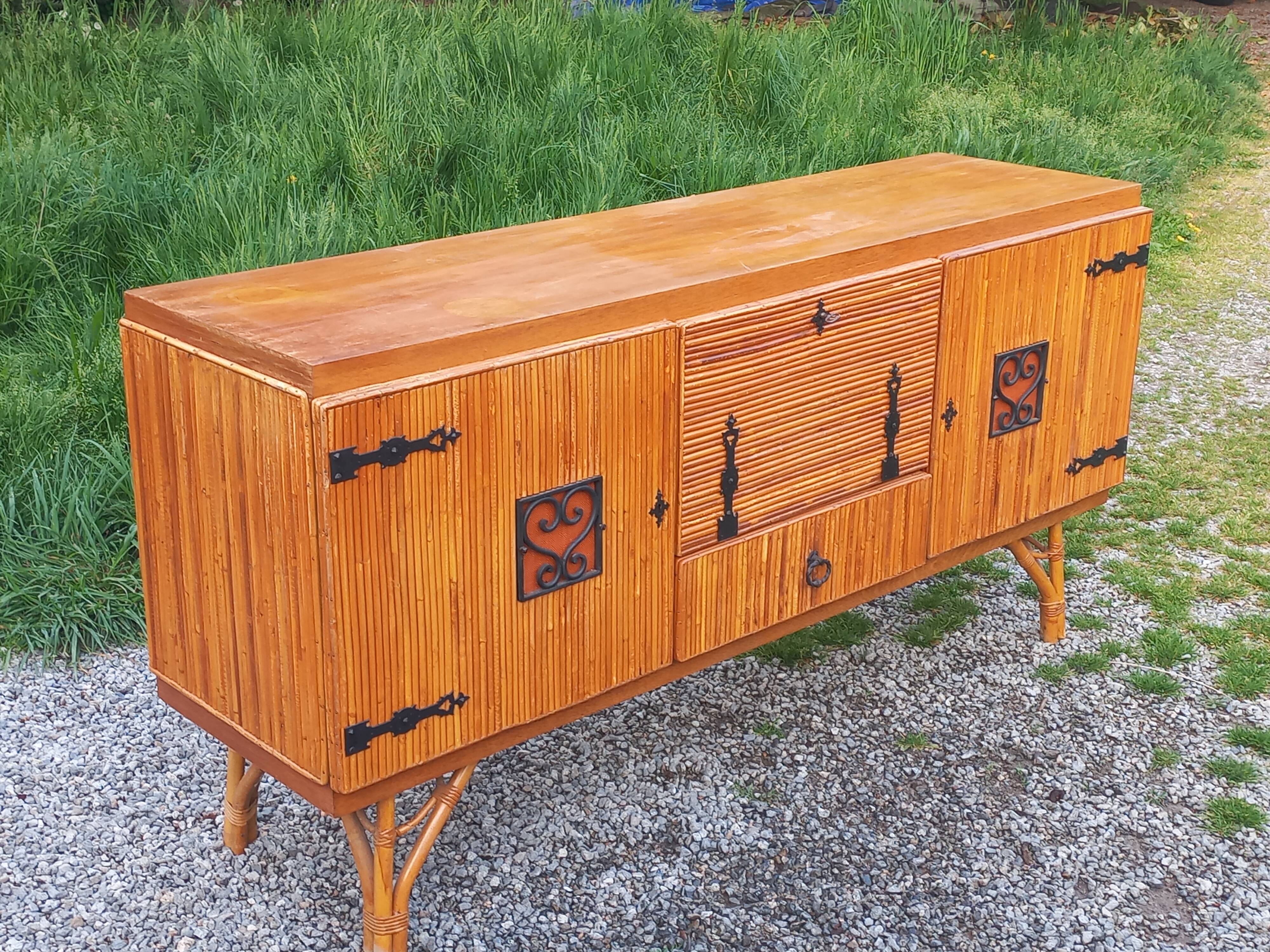 Bamboo and rattan enfilade attributed to Audoux and Minet.