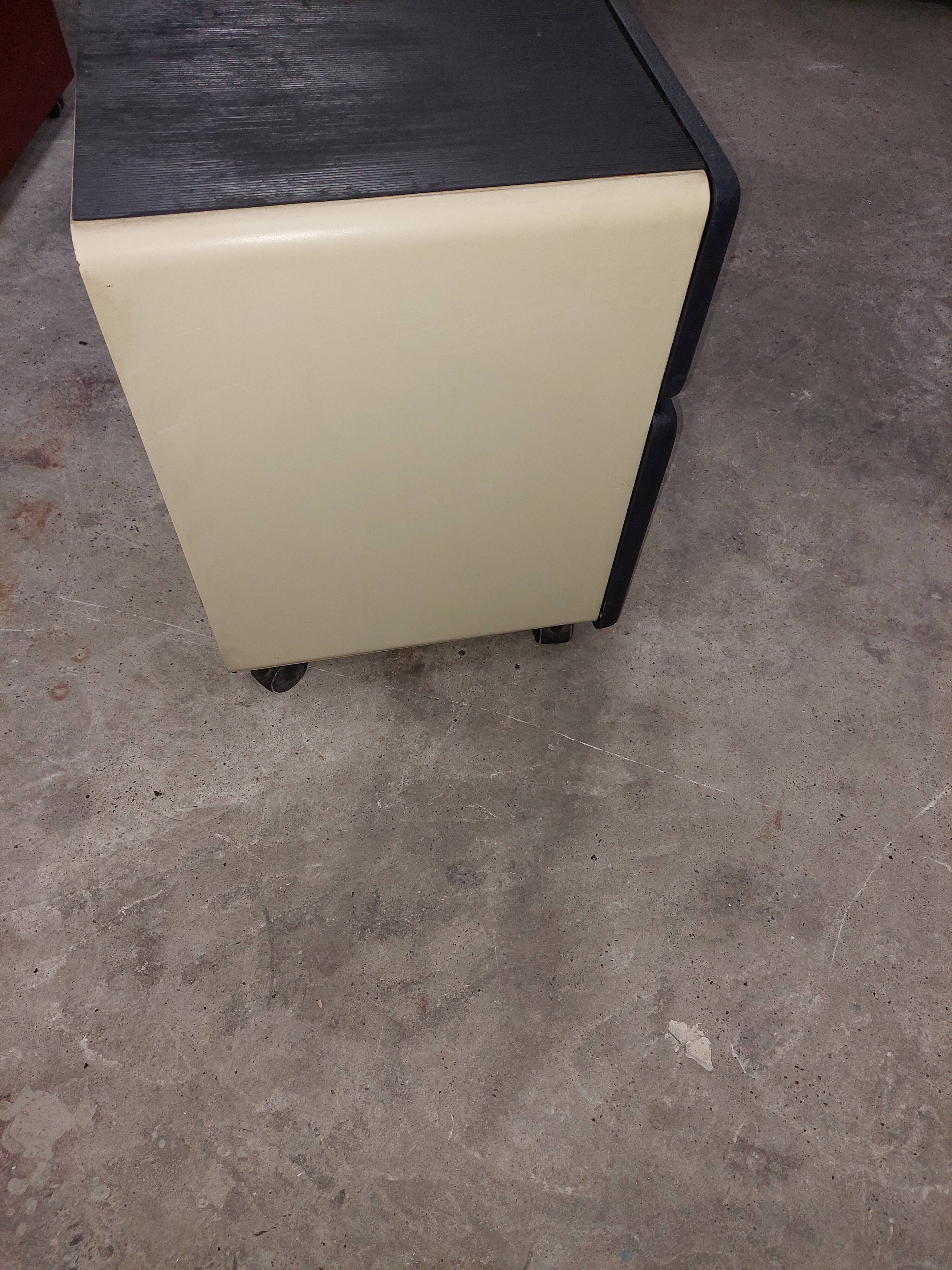 Metal box with used vintage keyless casters