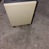 Metal box with used vintage keyless casters