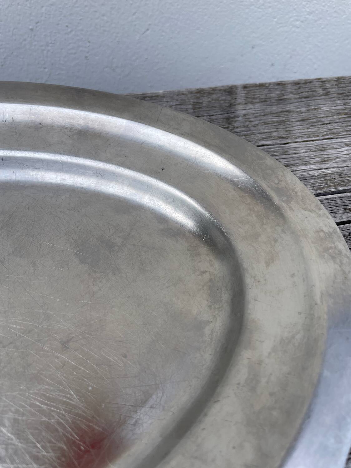 Oval stainless steel dish, signed Rémi Letang