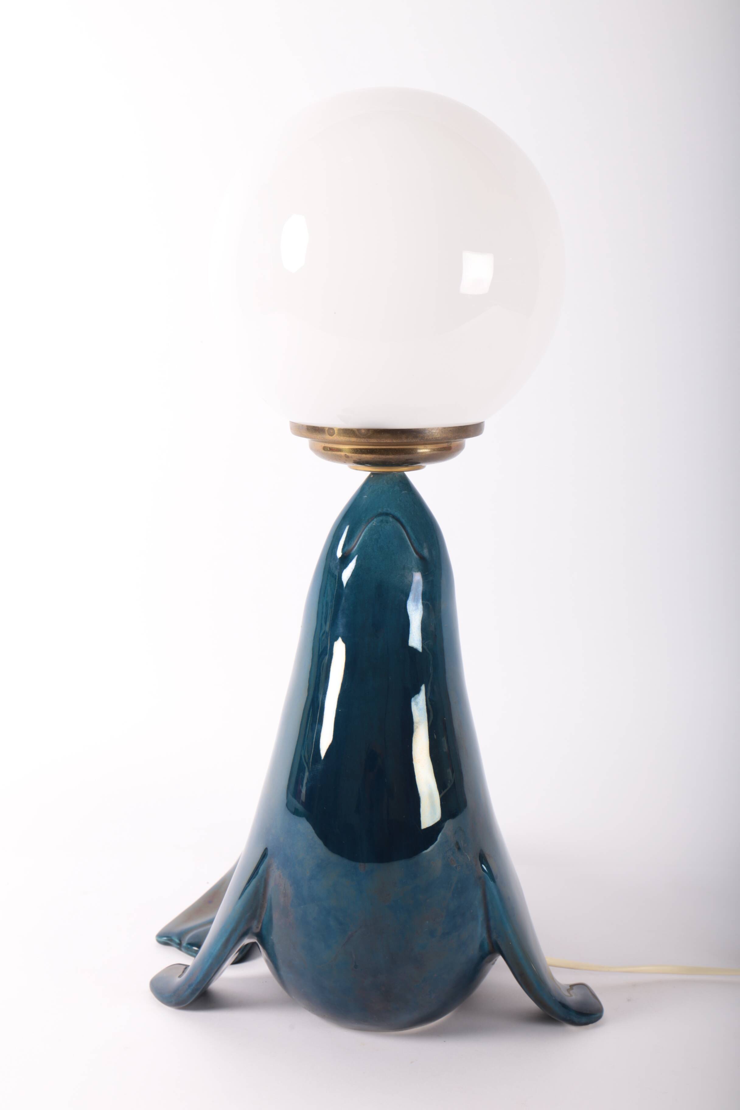 Blue ceramic sea lion lamp