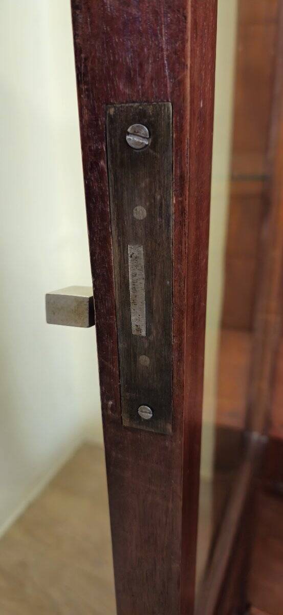 Important Art Deco library in amboyna and mahogany veneer.