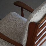 Modern Danish design, a pair of high-backed armchairs in oak and lambswool, 1950s.