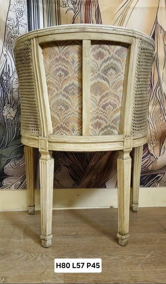 Gondola armchair in Louis XVI style, carved wood with a cream patina.