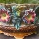 Antique jardinière in barbotine attributed to Onnaing with a floral motif.