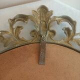 Gilded bronze mirror and screen-printed glass with flower motif