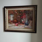 Still life with pink flowers and blue pots.