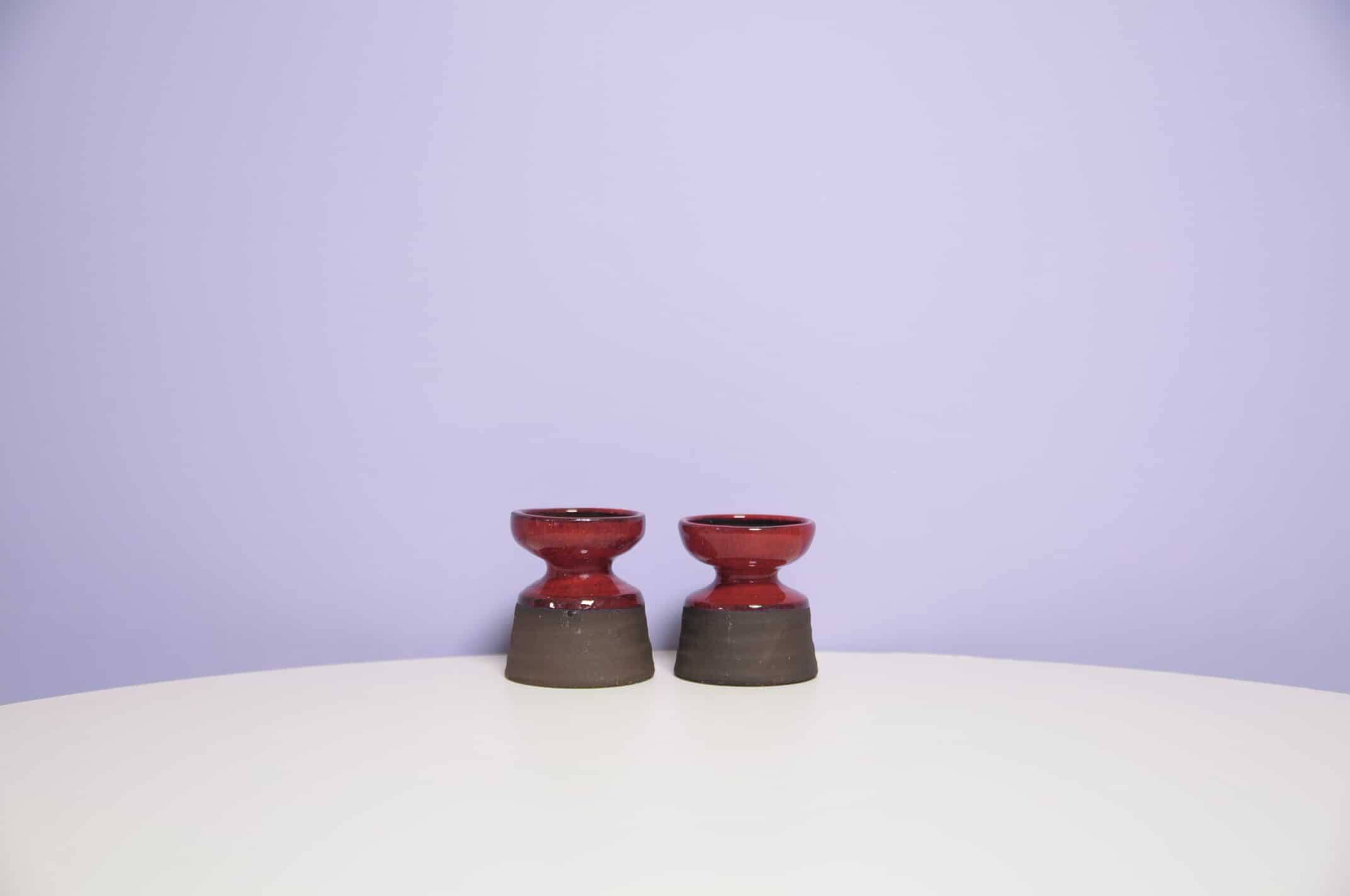 set x2 brown & red stoneware candlestick