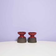 set x2 brown & red stoneware candlestick