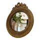 Round golden convex mirror with mouldings - witch's mirror