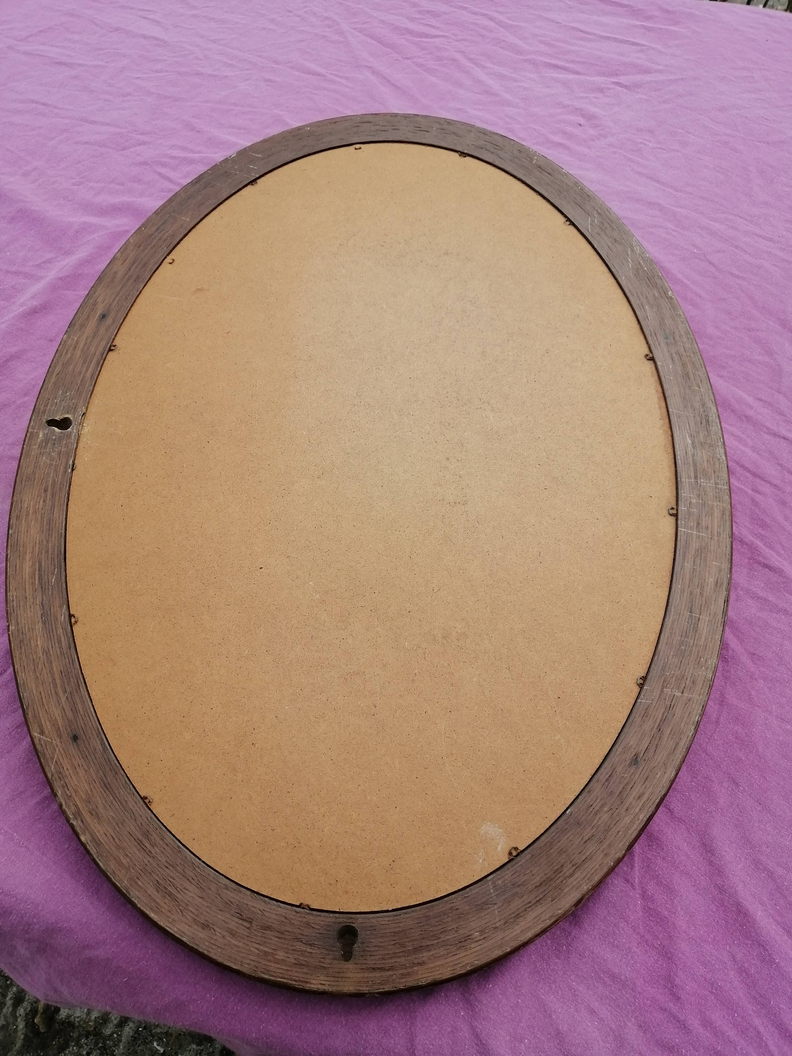 Wooden oval mirror