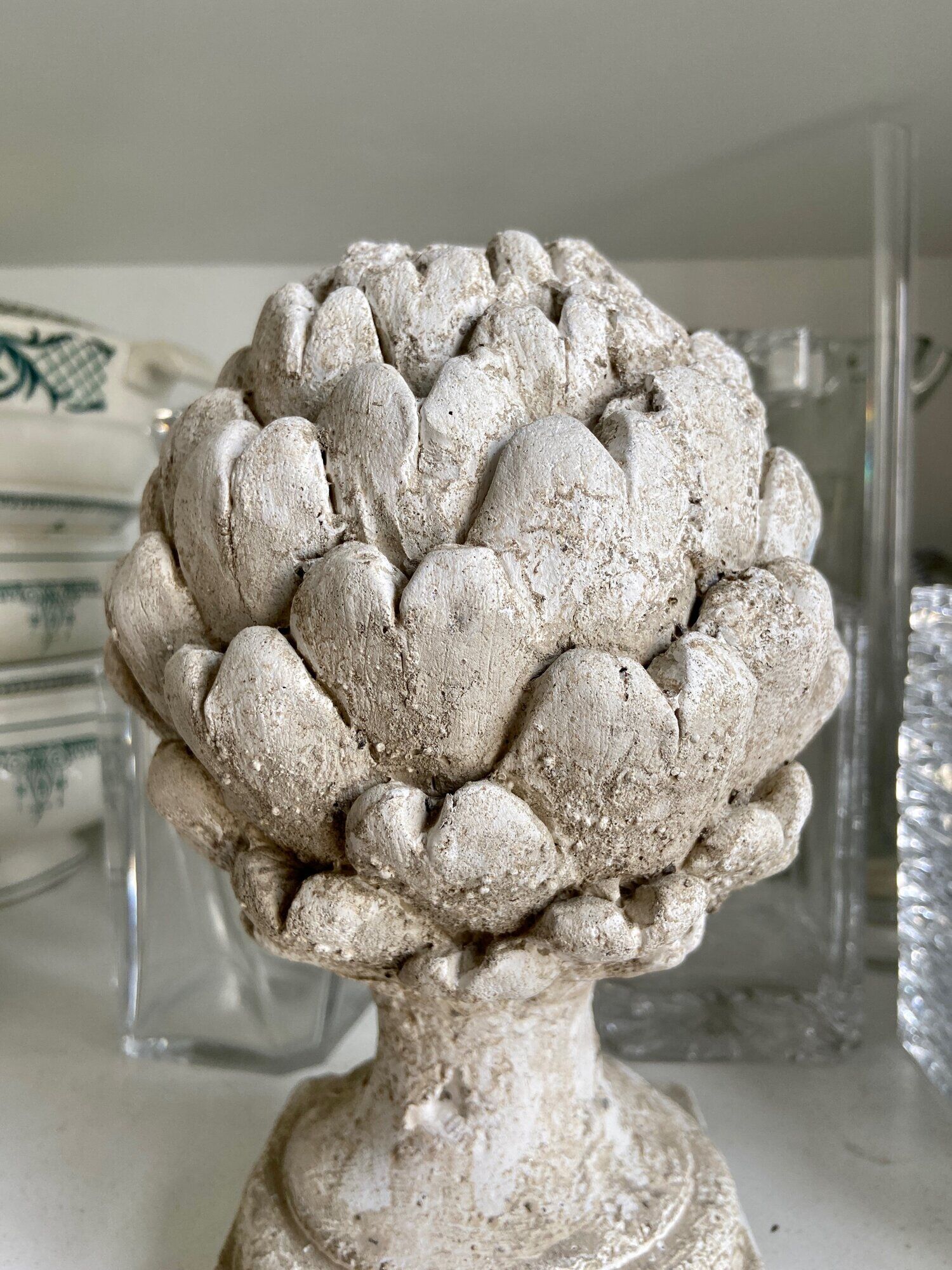 Ornamental artichokes in bleached concrete