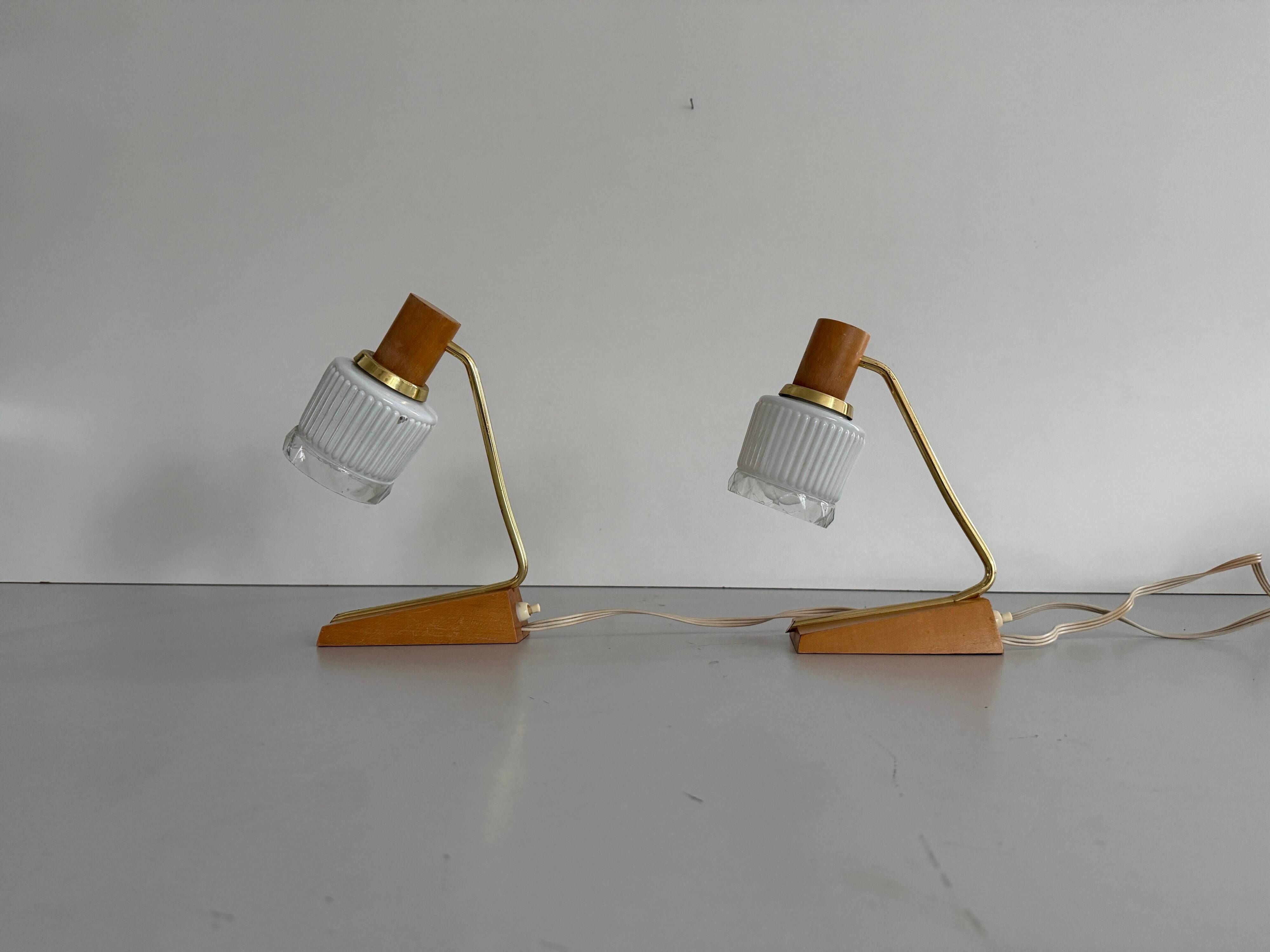 Pair of bedside lamps in brass and wood from the mid-century, 1960, Germany.