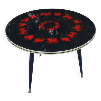 Table basse vintage dessus verre pieds tripode en bois noirci des années 60