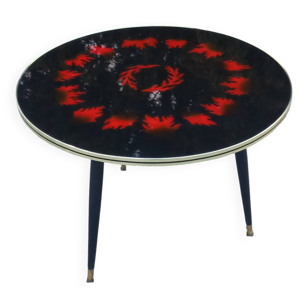Table basse vintage dessus verre pieds tripode en bois noirci des années 60