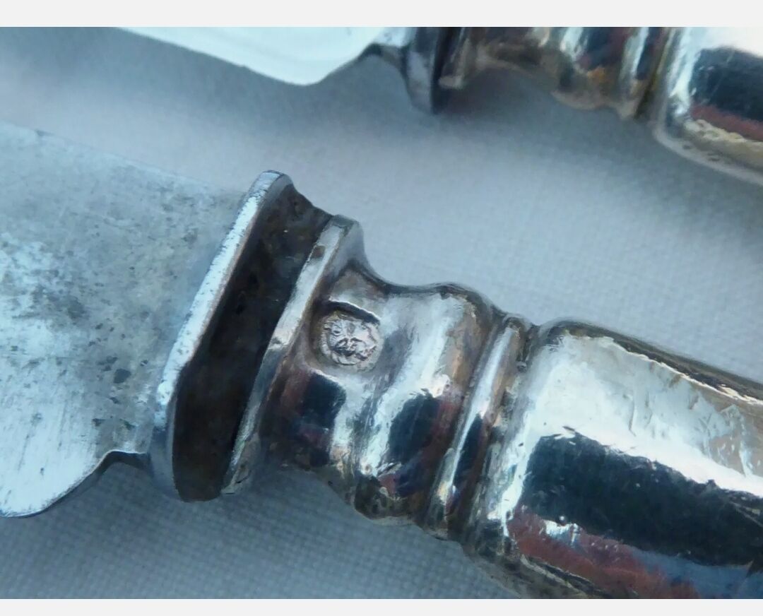 12 old filled silver handle knives