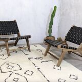 Art Deco armchairs in walnut wood and black leather