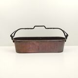 Copper planter and wrought iron handle