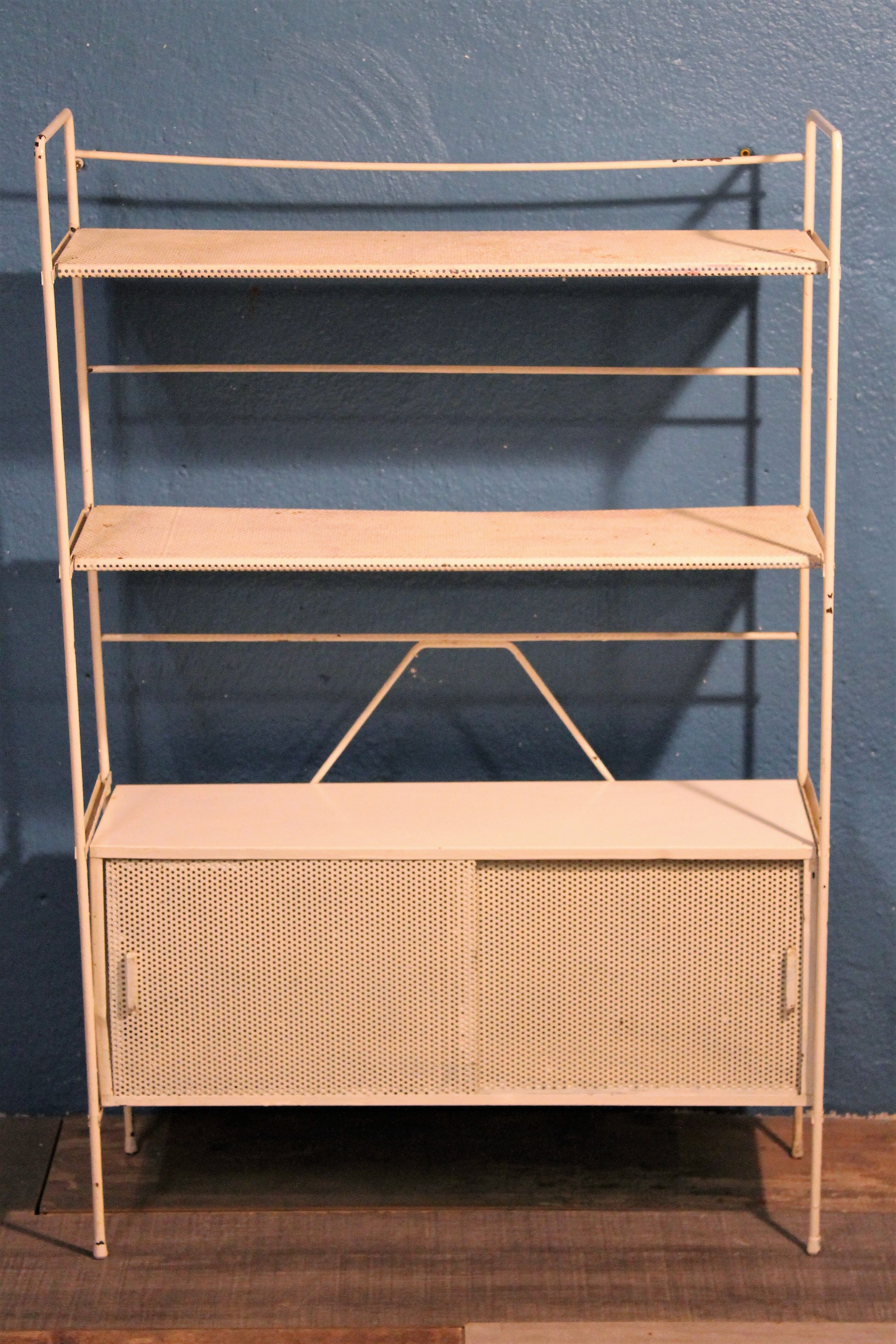 Perforated metal stand 1950