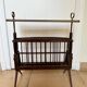 Folding magazine rack with shelf