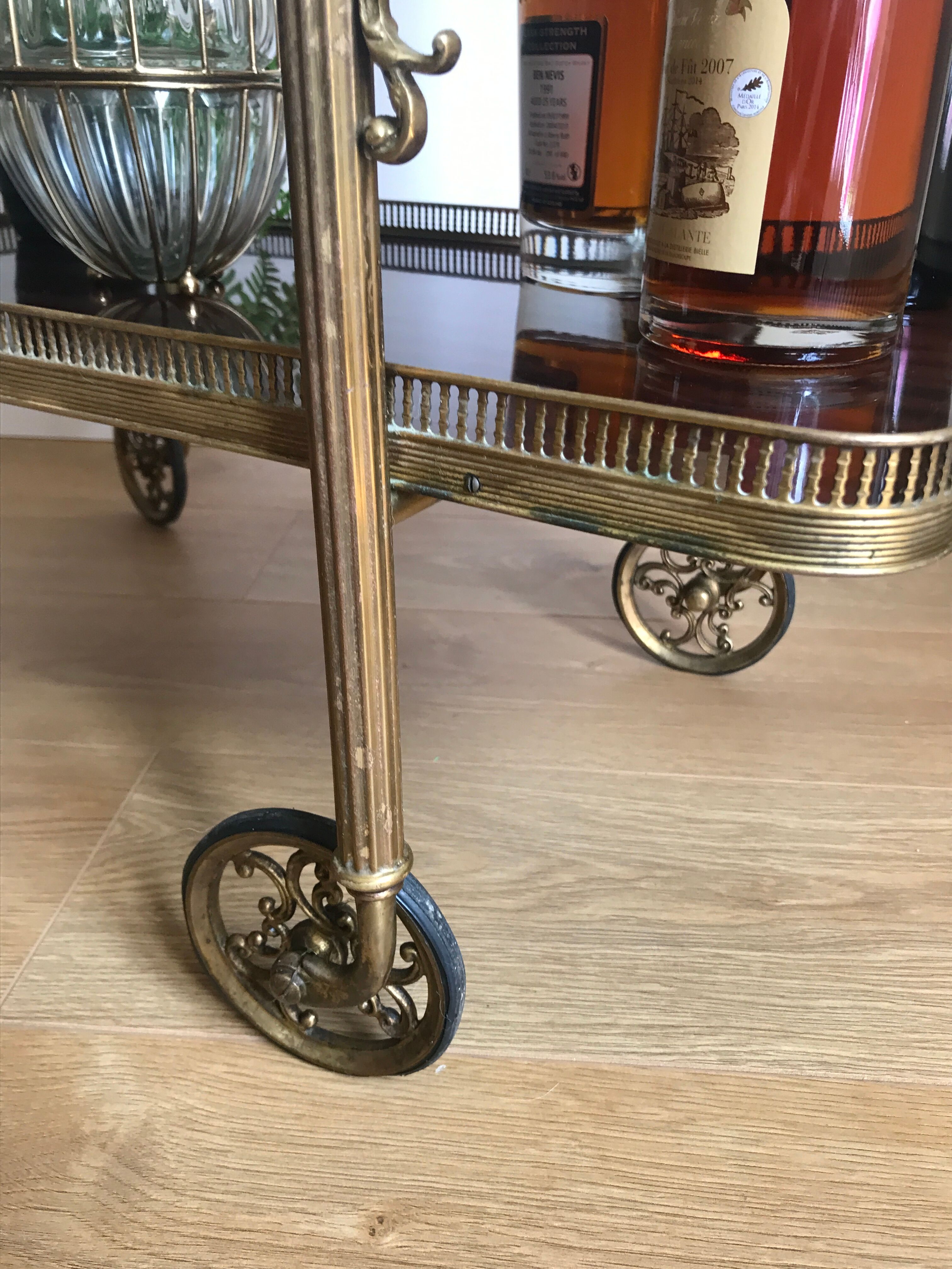 Service bar with vintage wheels in formica and brass 60s