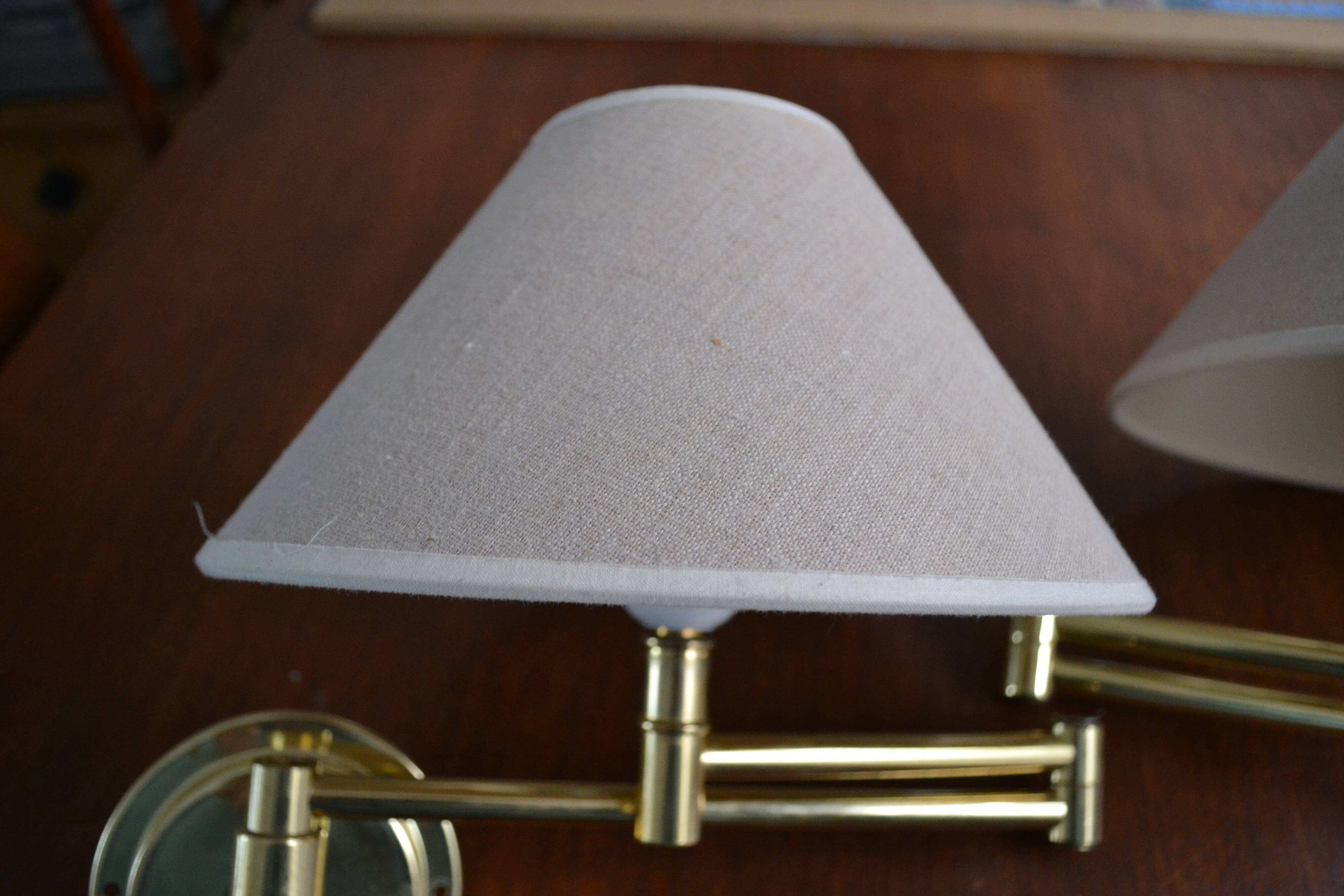 Pair of vintage gold articulated sconces