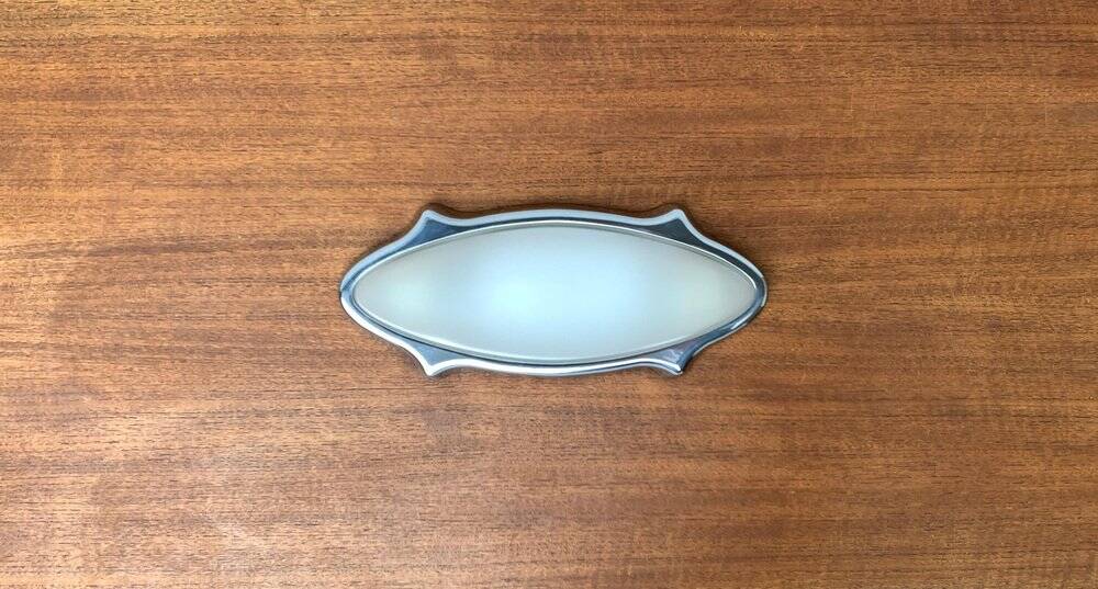 Postmodern Italian wall lamp for indoor and outdoor use, Geco 1 by Luciano Pagani and Angelo Perversi for Arteluce, 1990s.