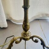 Floor lamp in gilded brass and round glass globe
